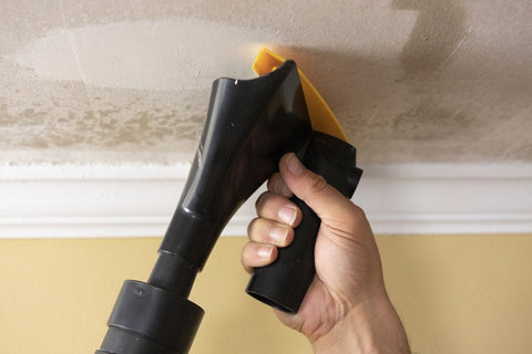POP EEZE in-use on ceiling shows quick, safer removal without debris falling.