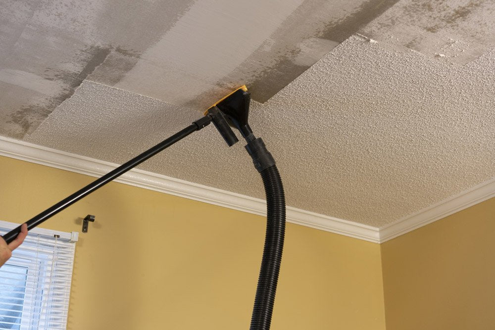 POP EEZE vacuum-compatible connection shows secure attachment for efficient ceiling texture removal.
