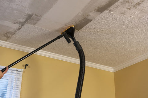 POP EEZE vacuum-compatible connection shows secure attachment for efficient ceiling texture removal.