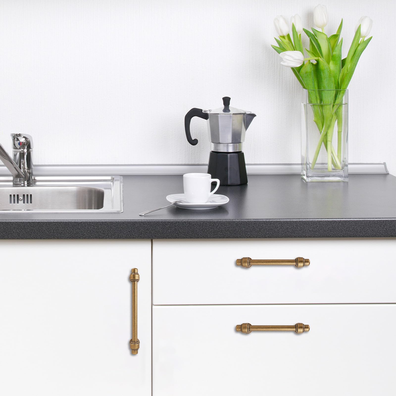 POVEFONK dresser drawer pull in antique brass enhances traditional room style.