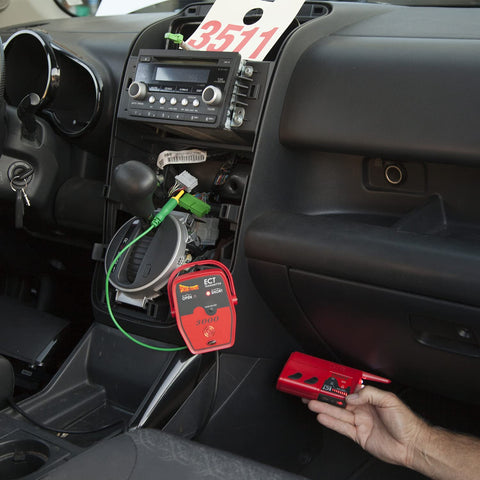 Fuel injector testing setup in workshop environment
