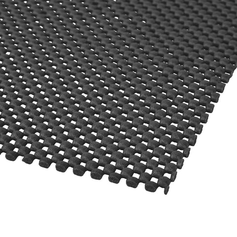 POWERTEC non-slip mat on a workbench securely grips boards for routing.