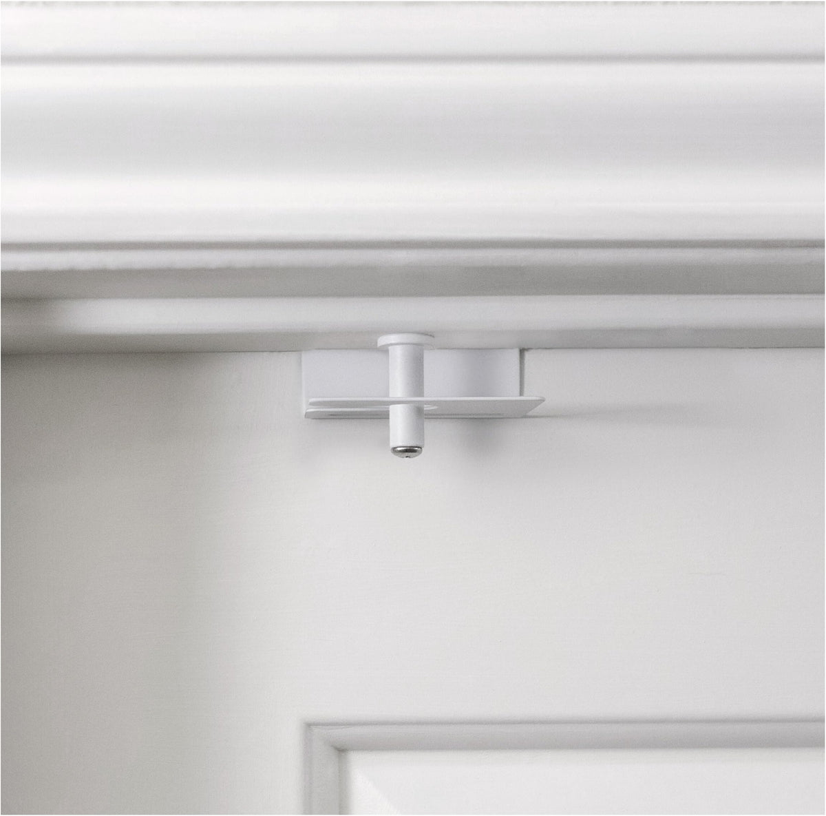 Predictable Solutions GlideLok door top lock on front view enhances child safety.