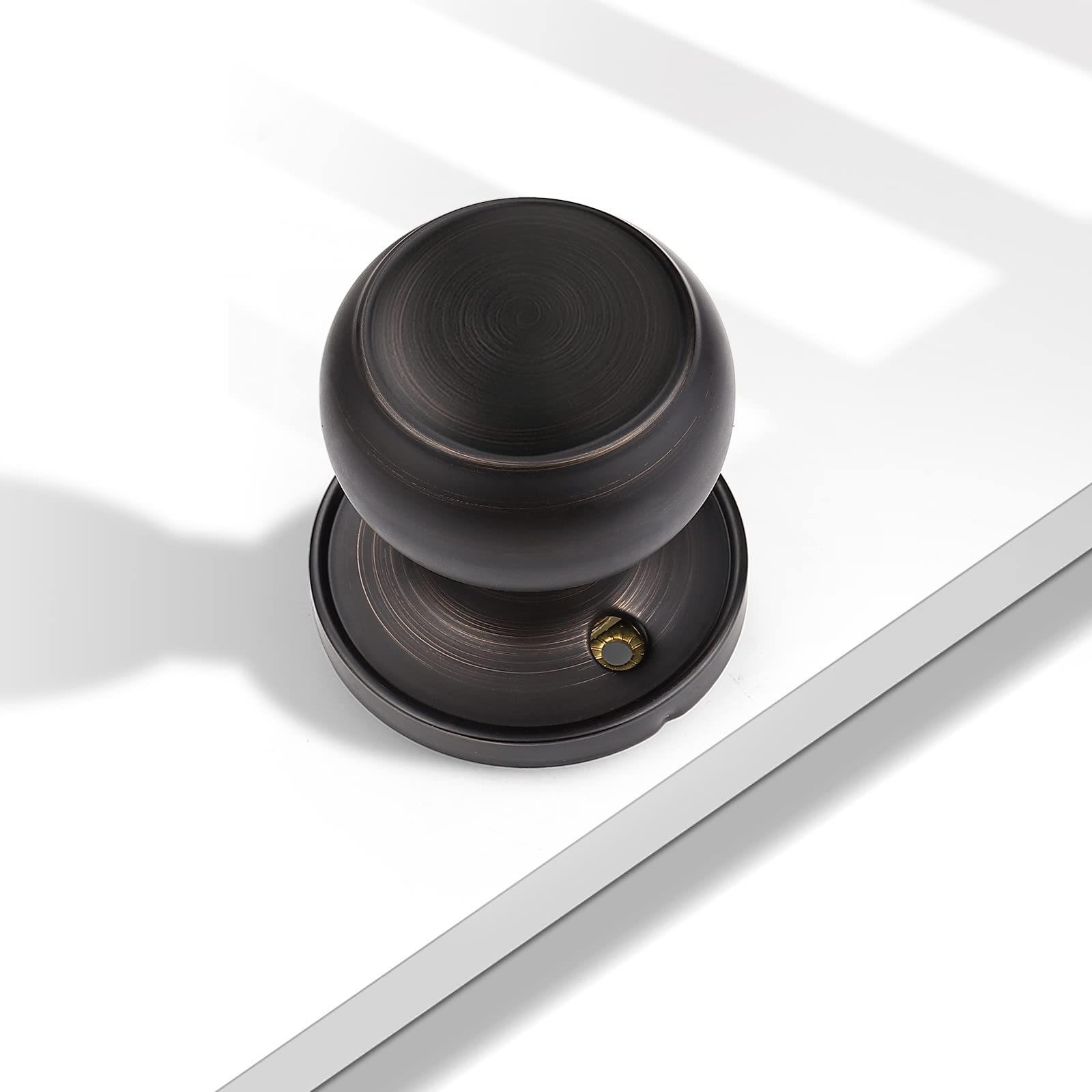Probrico oil-bronze finish highlights timeless style on dummy knobs.
