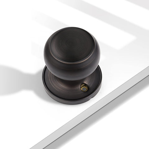 Probrico oil-bronze finish highlights timeless style on dummy knobs.