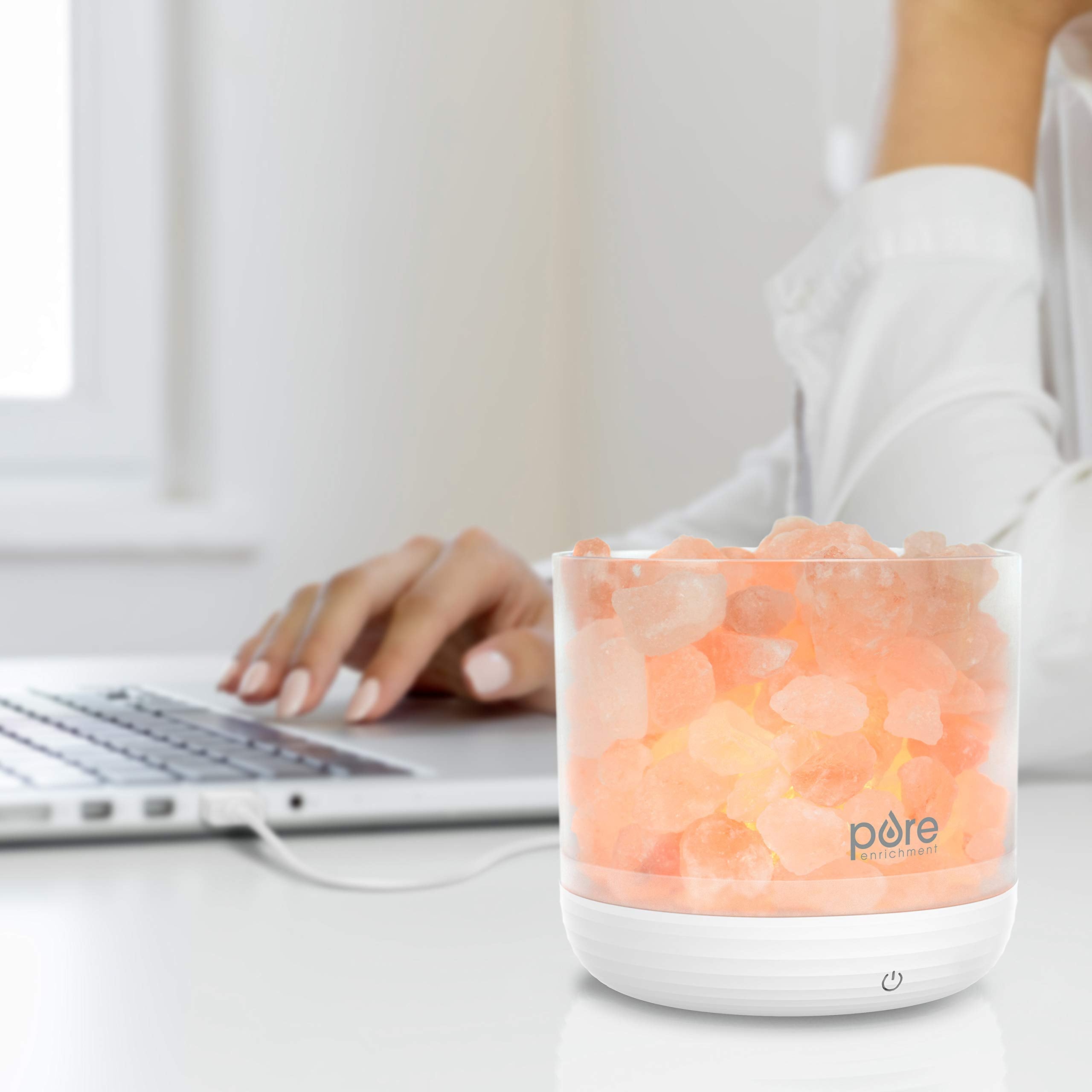 Touch-button control on the PureGlow lamp for easy on and brightness changes.