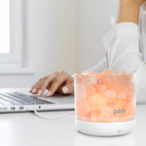 Touch-button control on the PureGlow lamp for easy on and brightness changes.
