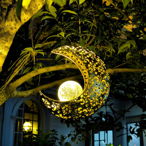 QCF crescent moon solar light for garden ambiance at night.