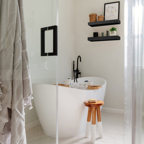 QEEIG black finish wall shelves elevate farmhouse style above the toilet.