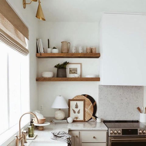 QEEIG book storage setup on long wall shelves above a desk