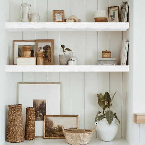 QEEIG floating shelves displaying plants and small keepsakes