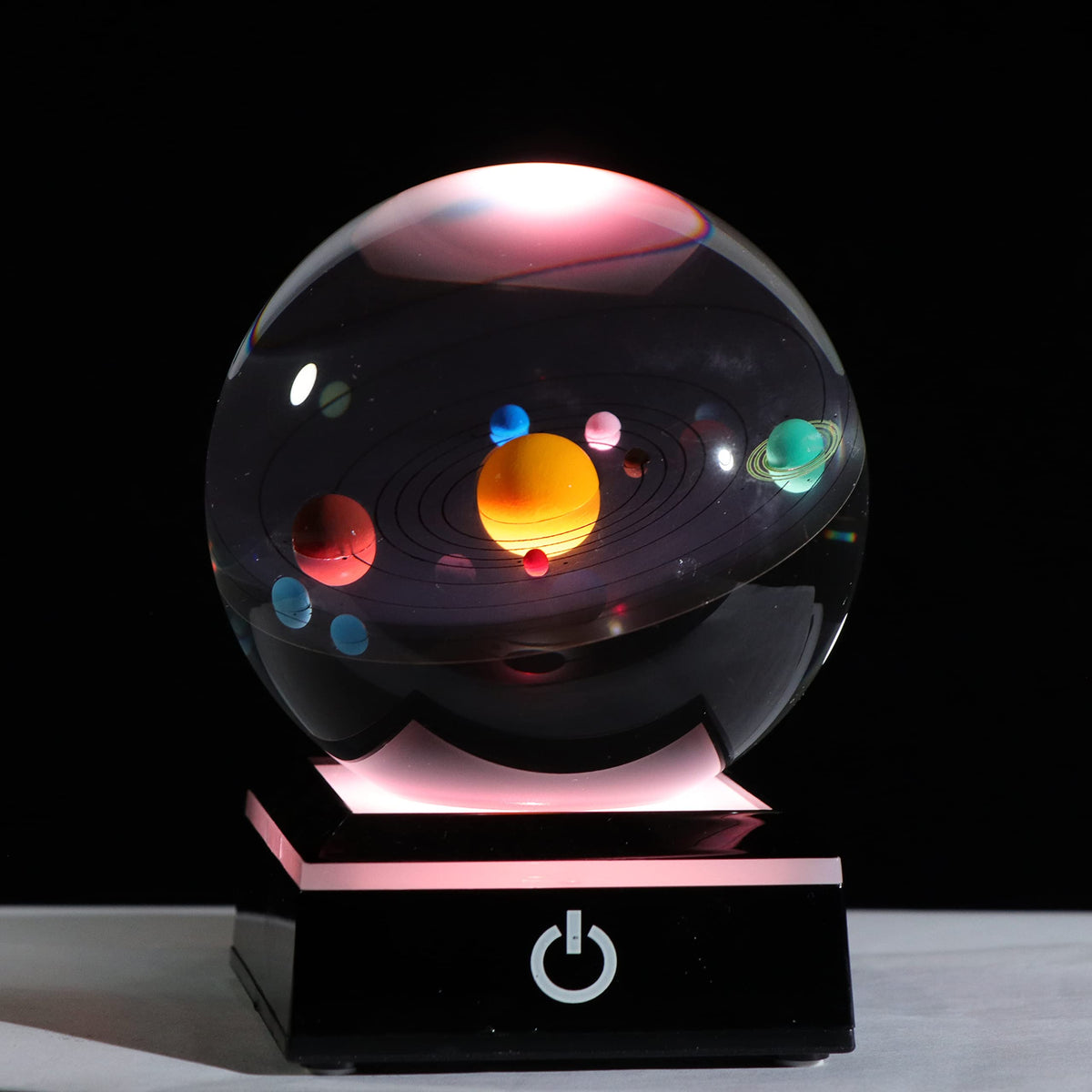 Qianwei crystal ball with solar system display for desk decor.