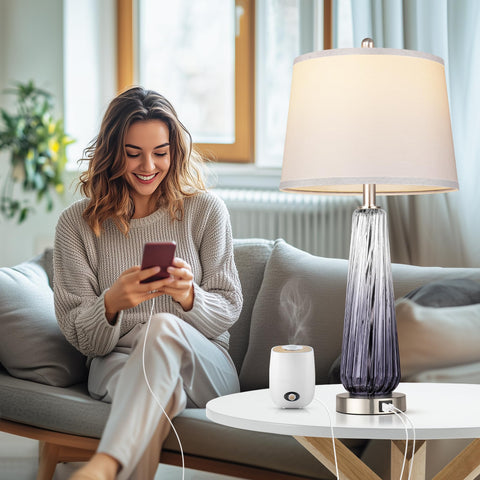 QiMH bedside lamps on nightstand with USB ports for charging devices
