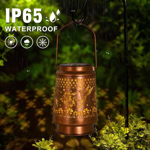 QPPDER hummingbird solar lantern on patio for ambient outdoor lighting