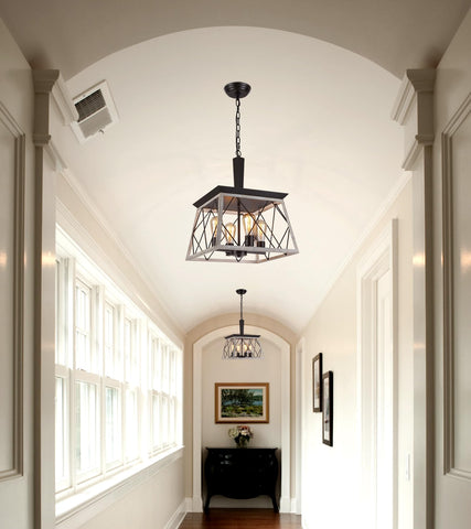 Q&S pendant light over kitchen island provides stylish task lighting and timeless charm.
