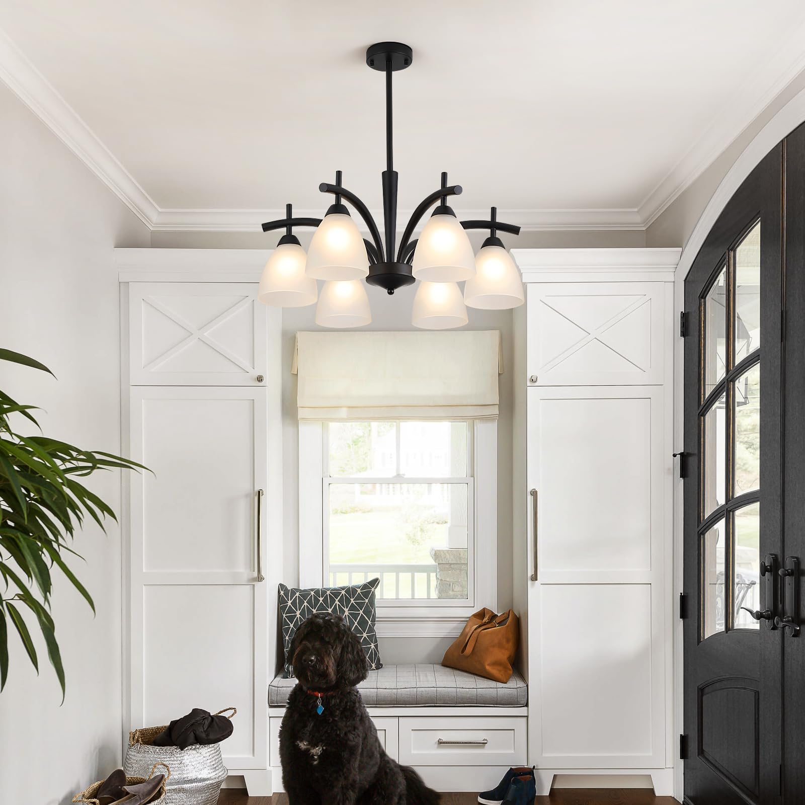 Q&S bedroom chandelier provides soft, ambient light with frosted glass and sturdy arms.
