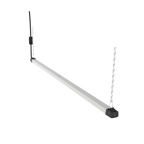 Quarterback 4ft LED shop light ceiling mount brightening a garage workspace.