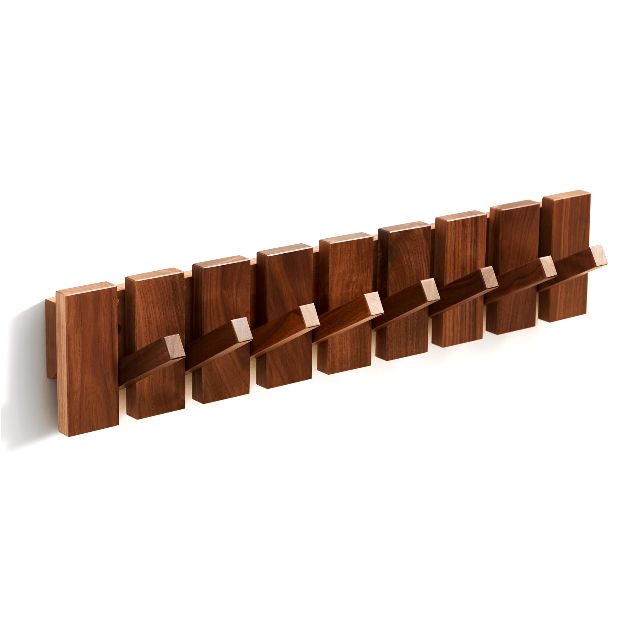 Quellance decorative wall rack blends art and function in living spaces.