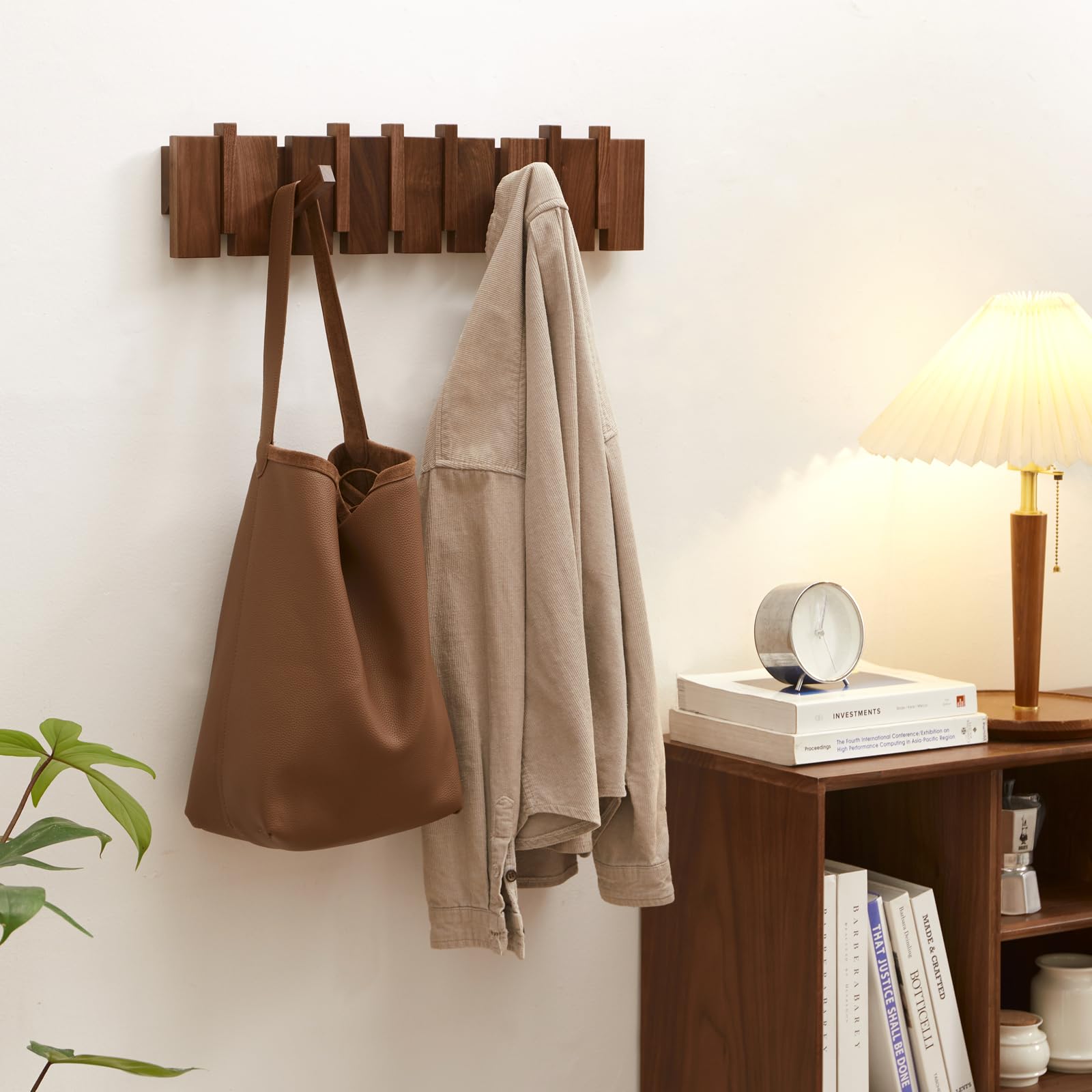 Quellance wall-mounted coat hanger keeps hats and keys neatly within reach.