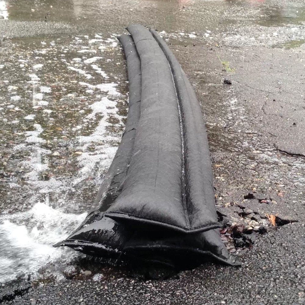 Flexible wedge design prevents barrier from rolling in moving water