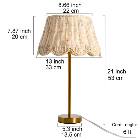 Quincry Premium scalloped rattan lamp on nightstand with warm glow