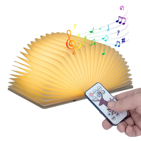 QXMGCBOK Dragon Bluetooth speaker with night light for cozy bedroom listening.