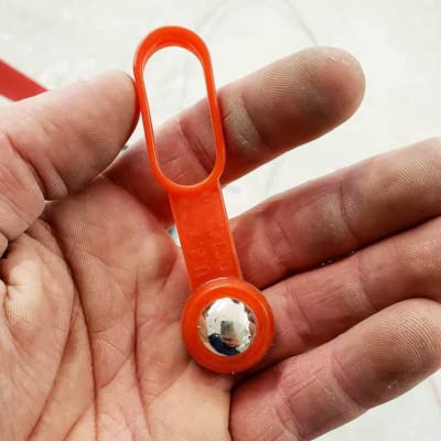 Rack-A-Tiers Stud Ball ergonomic handheld tool for walls