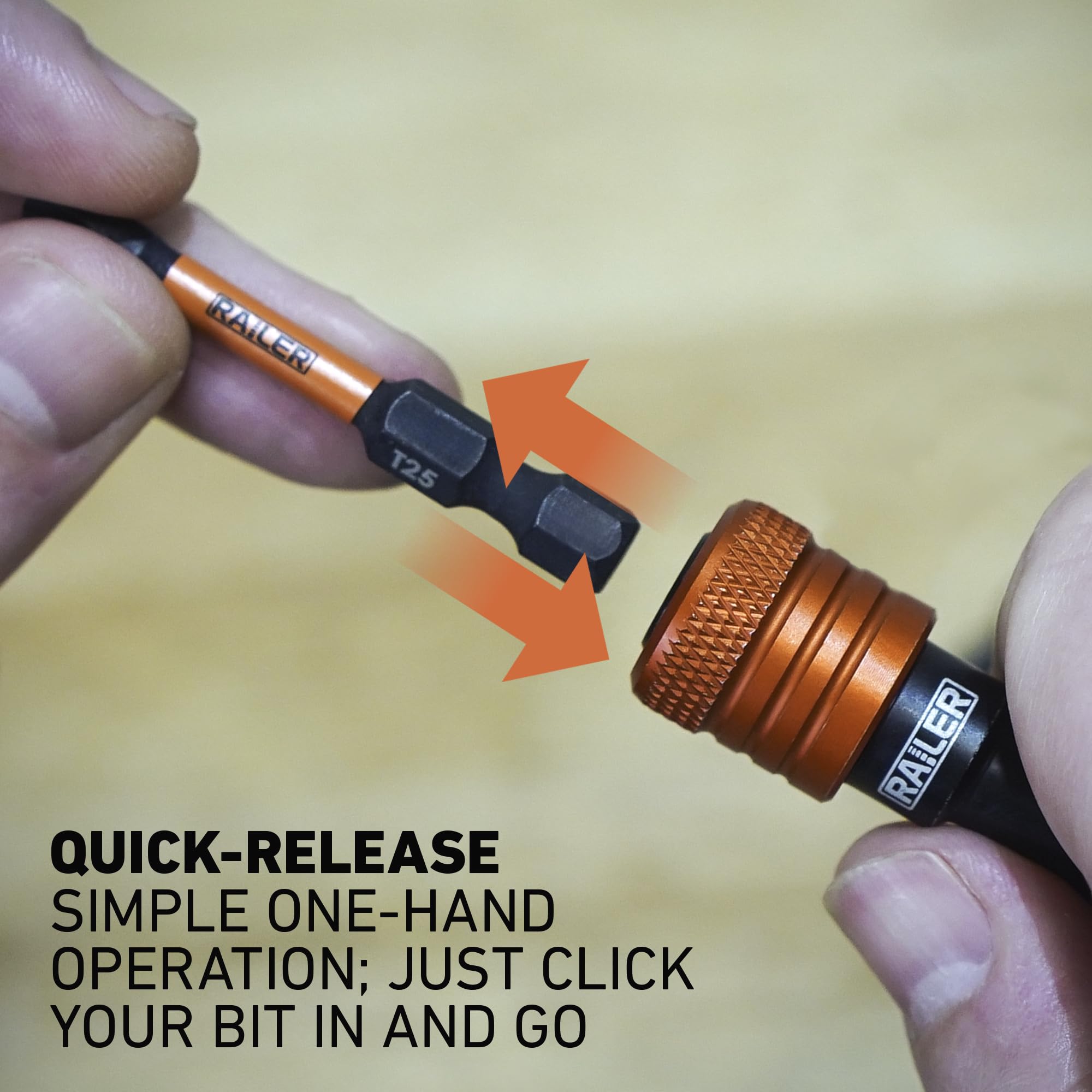 Railer bit holder with carabiner attached for secure belt or tool bag.