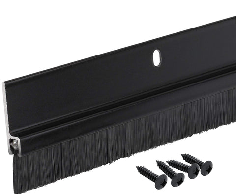 Randall Manufacturing Co. door sweep with aluminum body and black brush sealing gaps up to 1 inch.