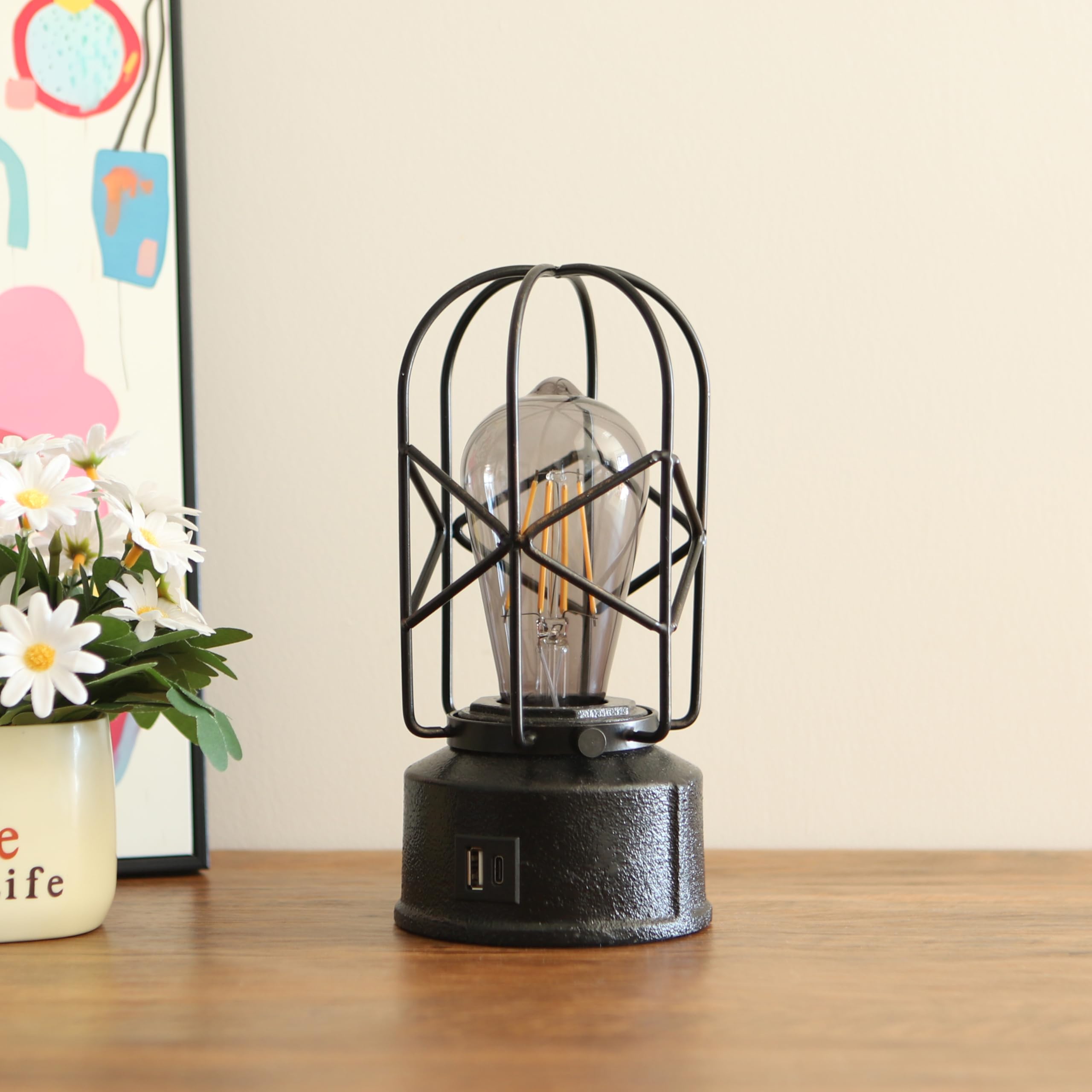 Rarlonly bedside lamp on a nightstand beside books and cup