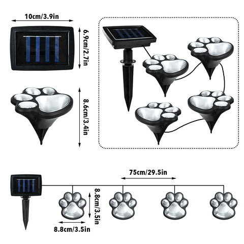 Ratopo paw print solar light glowing softly in the yard at dusk.