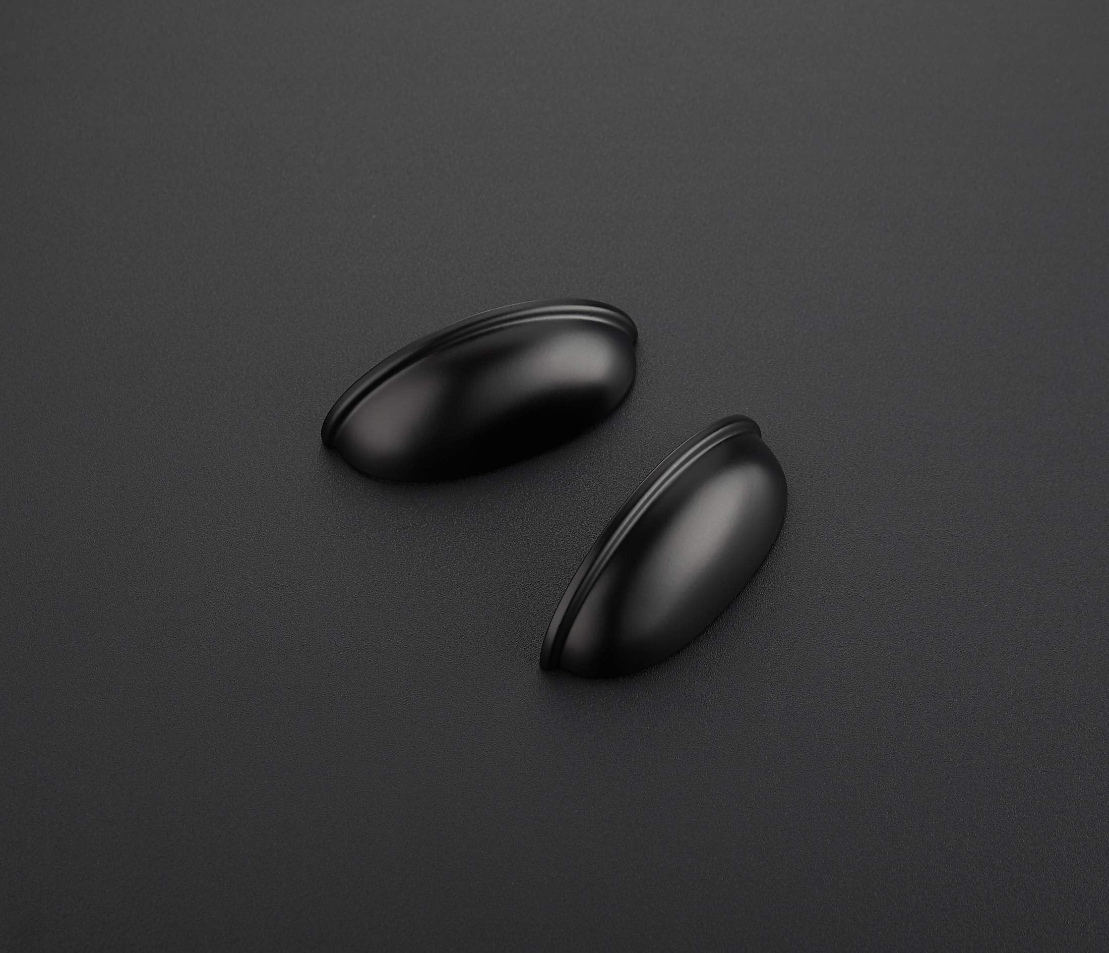 Ravinte flat black drawer pull close-up showing smooth finish and grip