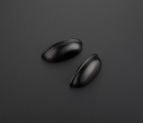 Ravinte flat black drawer pull close-up showing smooth finish and grip