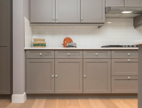 Ravinte dresser front knob adds uniform metallic charm across furniture.