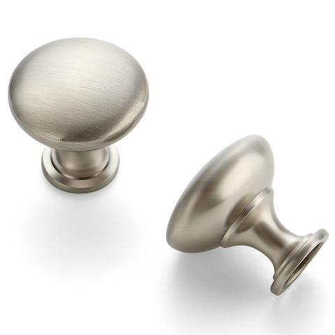 Ravinte brushed nickel round cabinet knob on a kitchen cabinet, durable zinc construction