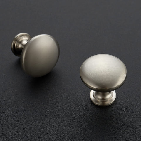 Ravinte brushed nickel round cabinet knob on a bathroom vanity, versatile finish