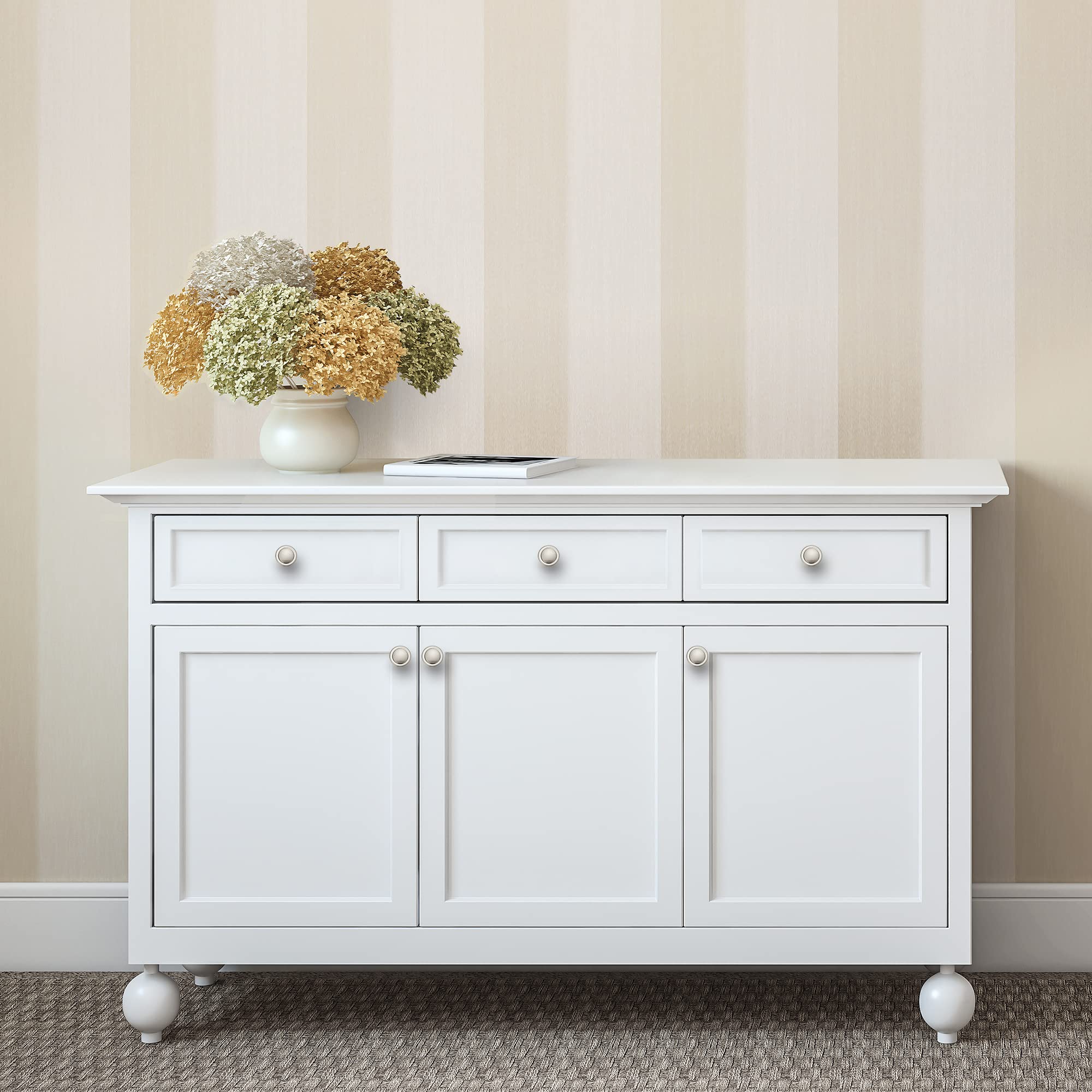 Ravinte round knob on a drawer front highlights classic form.