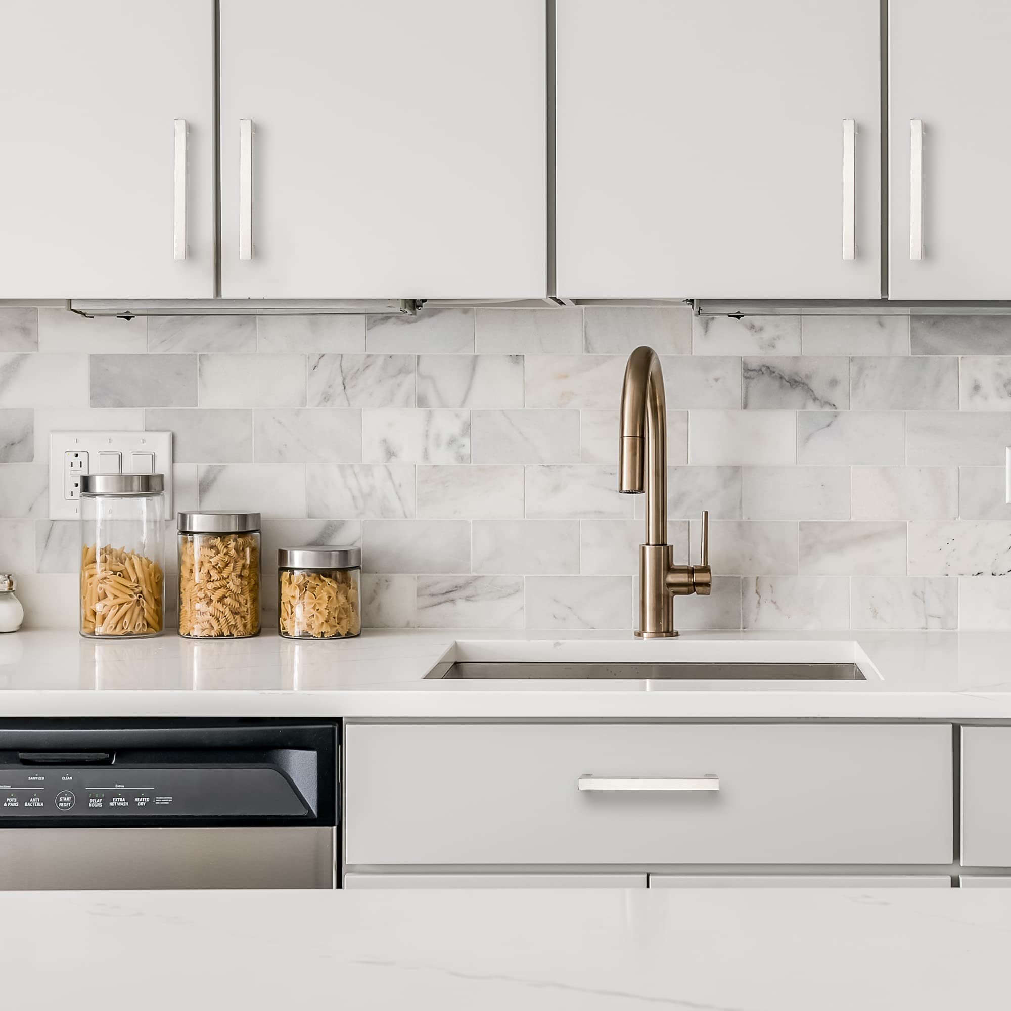 Ravinte brushed nickel square cabinet handle on a dark cabinet