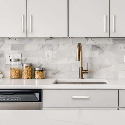 Ravinte brushed nickel square cabinet handle on a dark cabinet