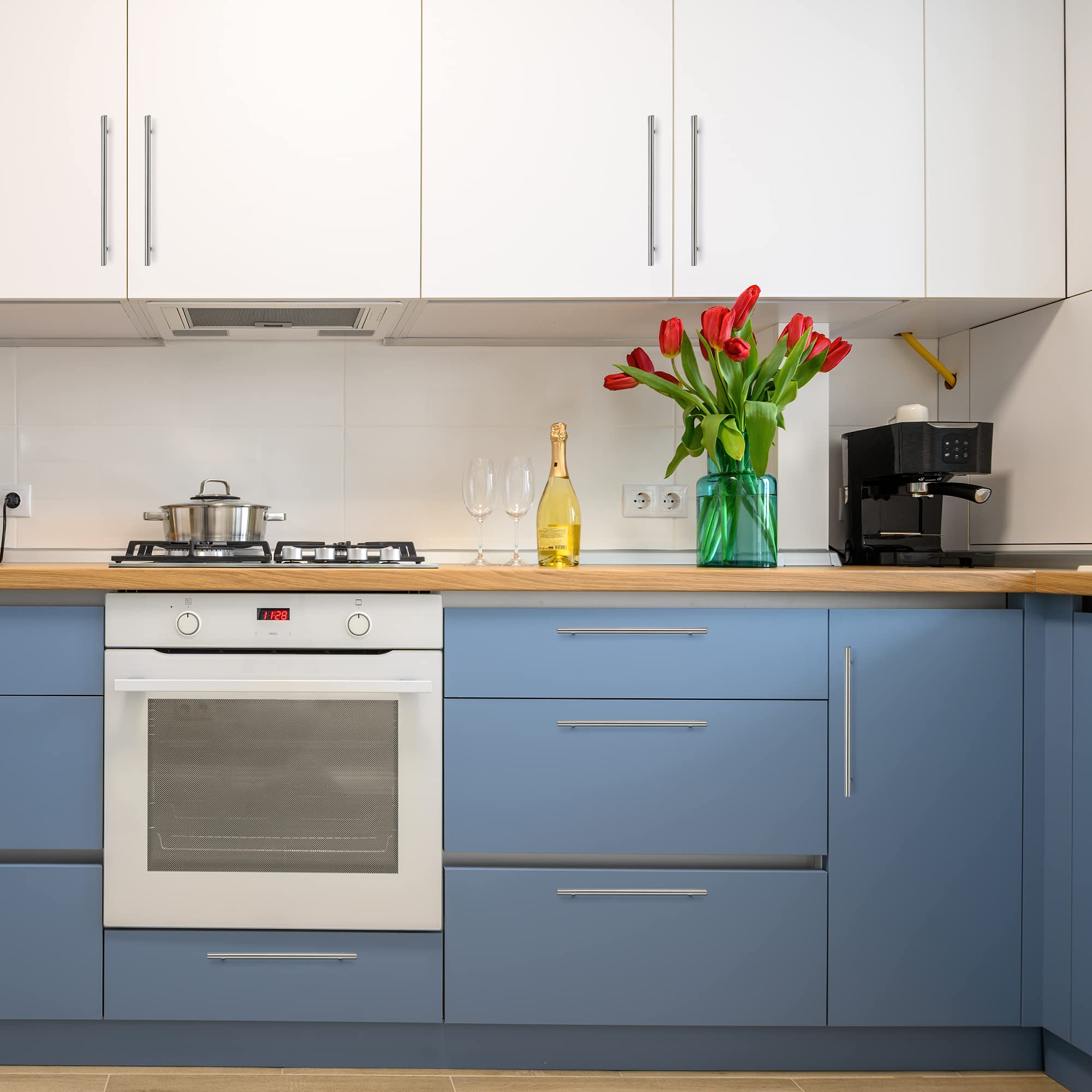 Ravinte brushed nickel finish on a cabinet handle complements contemporary kitchens.