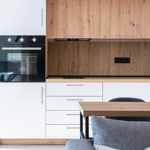 Ravinte stainless-look cabinet handle in a modern kitchen scene.