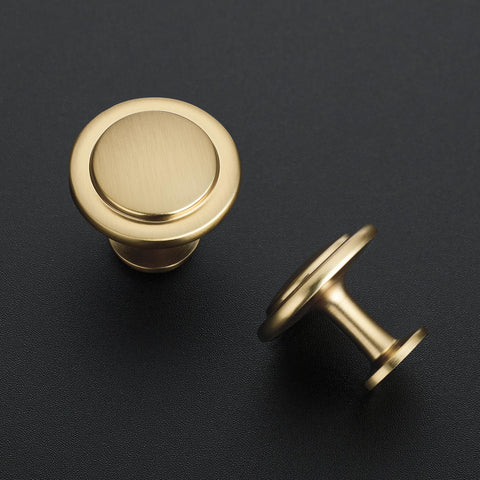 Ravinte champagne bronze knob on a drawer front to upgrade furniture style.