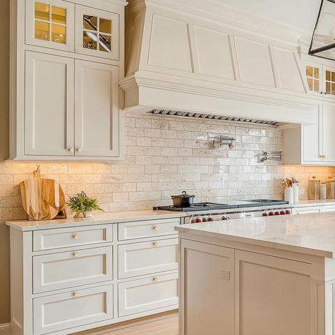Ravinte champagne bronze knob reflected in a bright surface for a premium look.