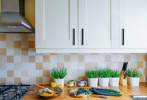 Ravinte pulls on kitchen cabinets complement farmhouse-style decor.