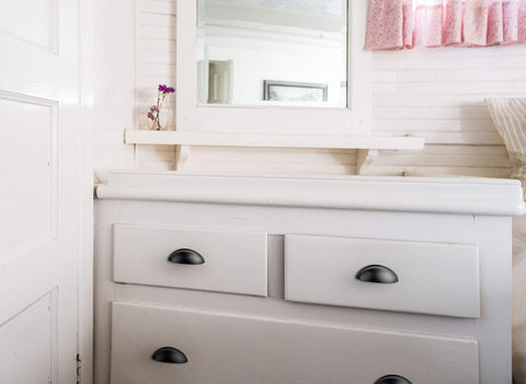 Ravinte dresser pulls in flat black for cohesive furniture update