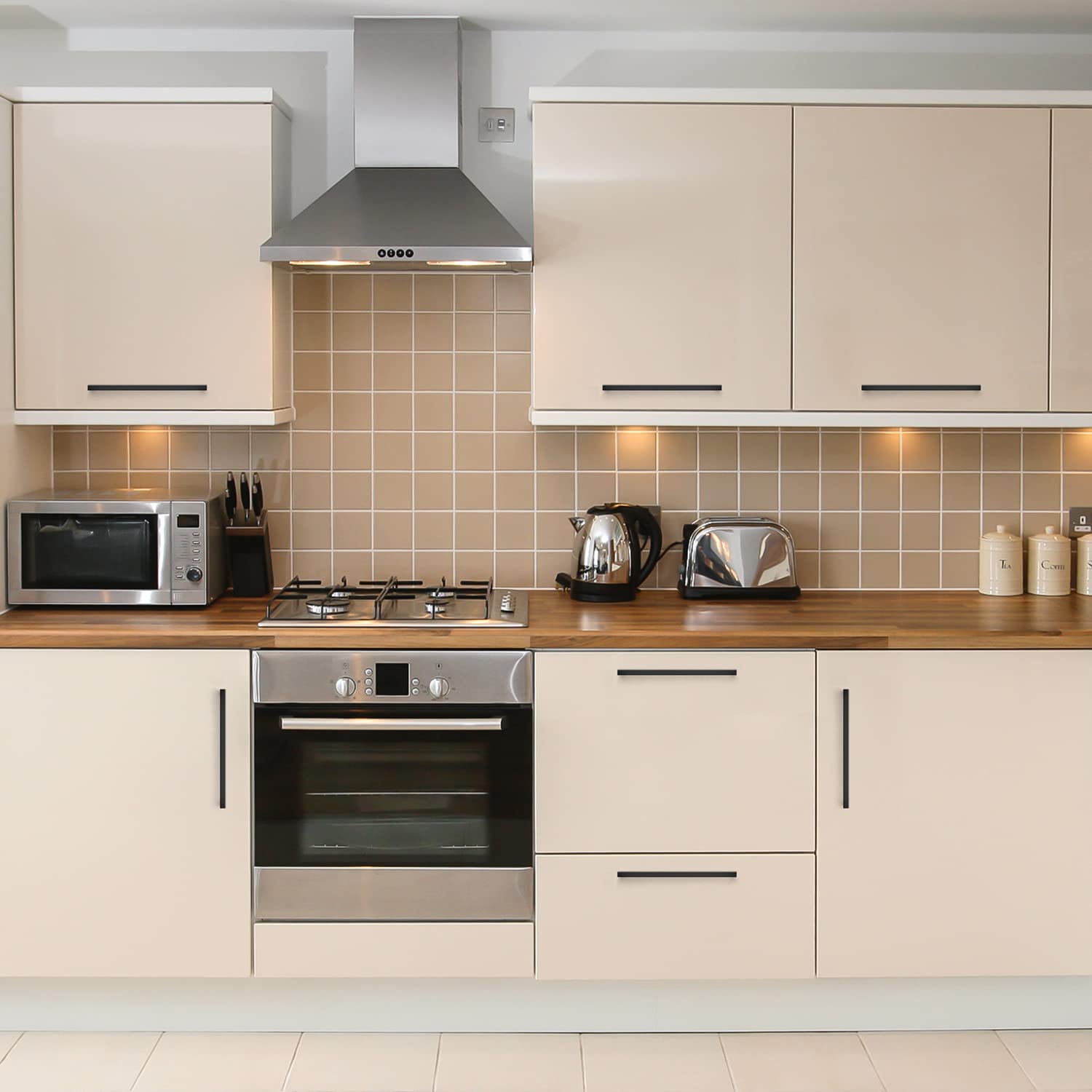 Matte black cabinet handles complement farmhouse and modern cabinets.