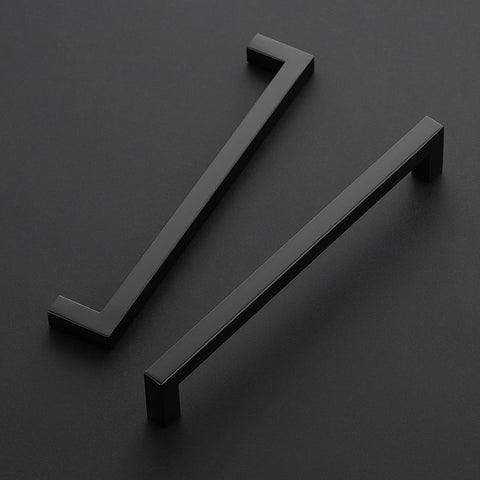 Ravinte matte black 8-inch cabinet pull installed on a cabinet door