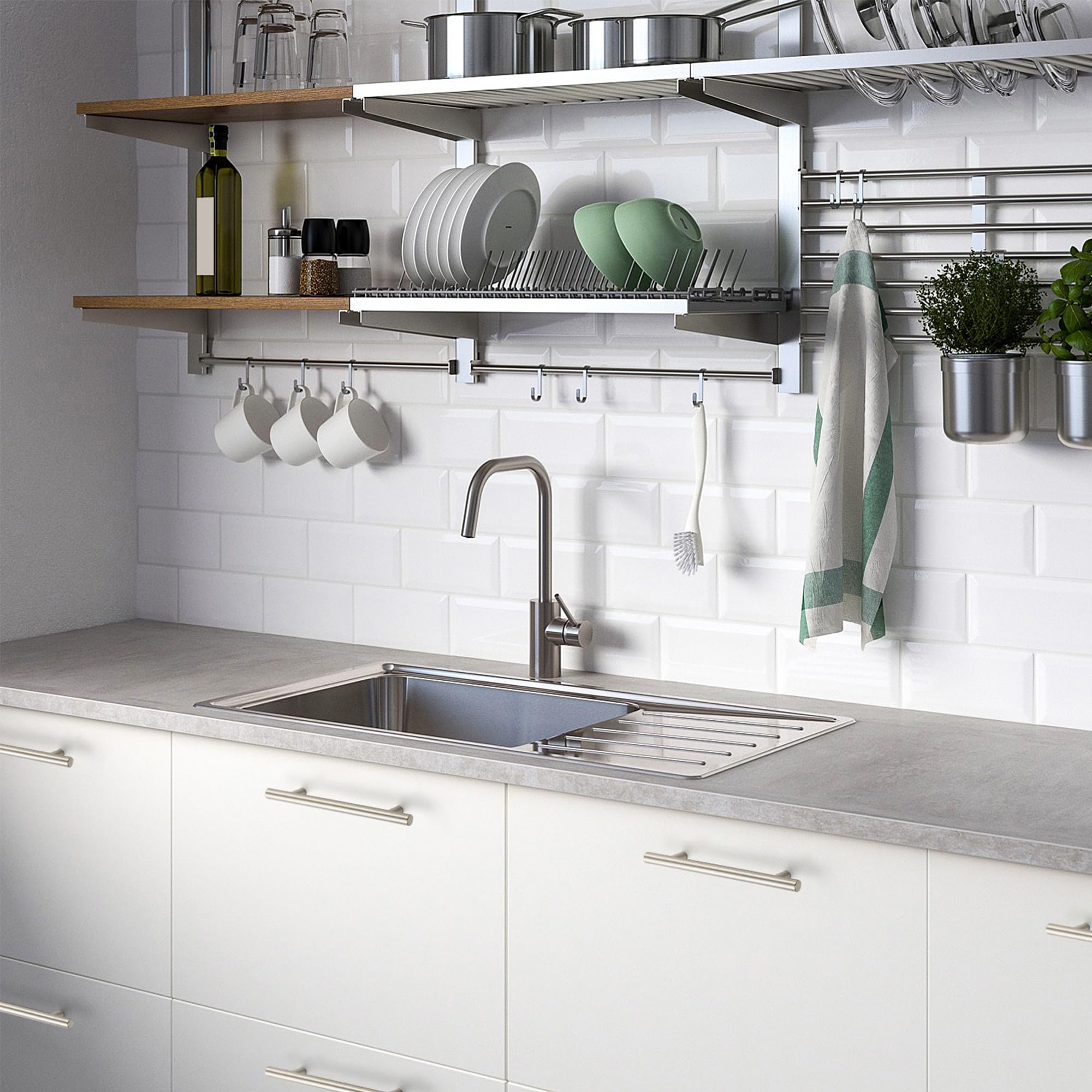 Ravinte pulls pair with nickel appliances for cohesive kitchen look.