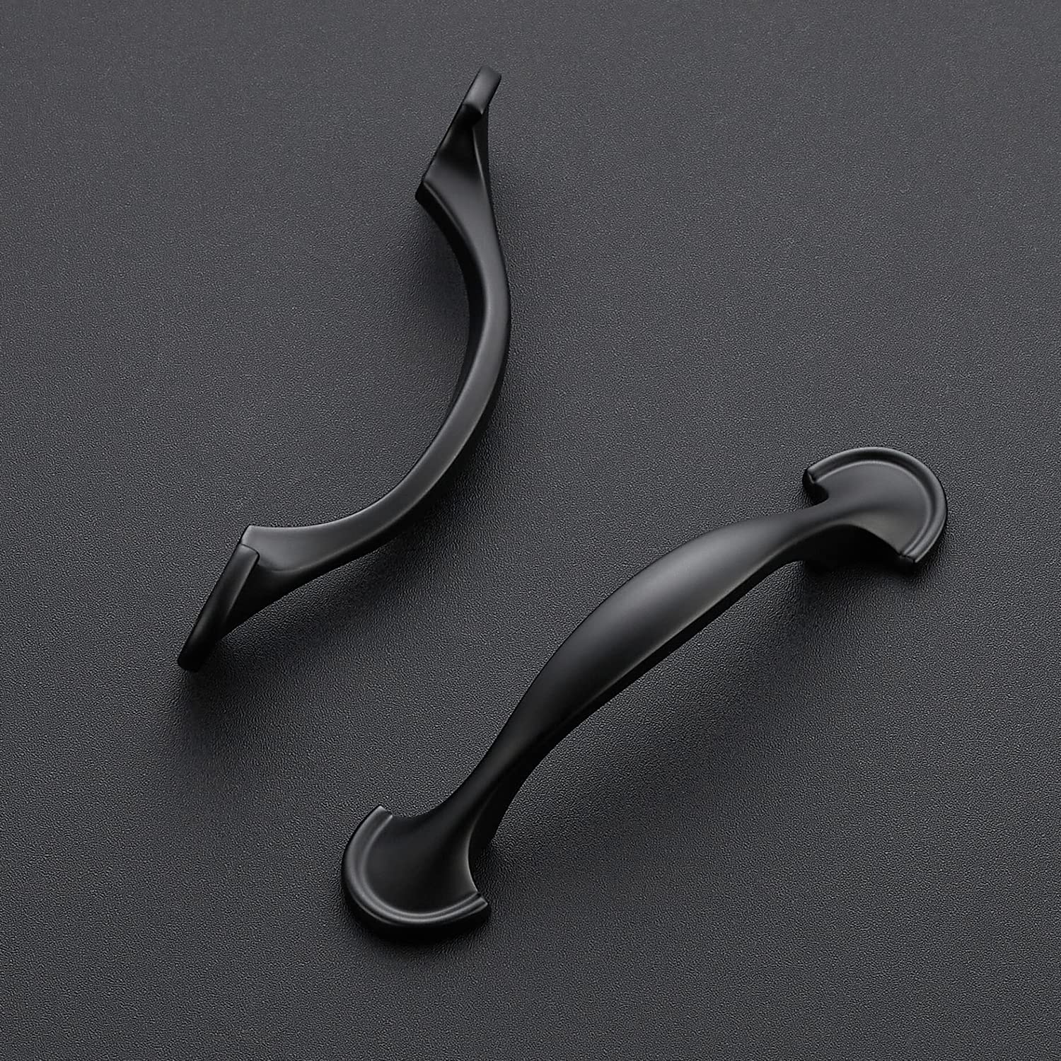 Ravinte rounded-foot arch pull in matte black enhances drawers' grip.