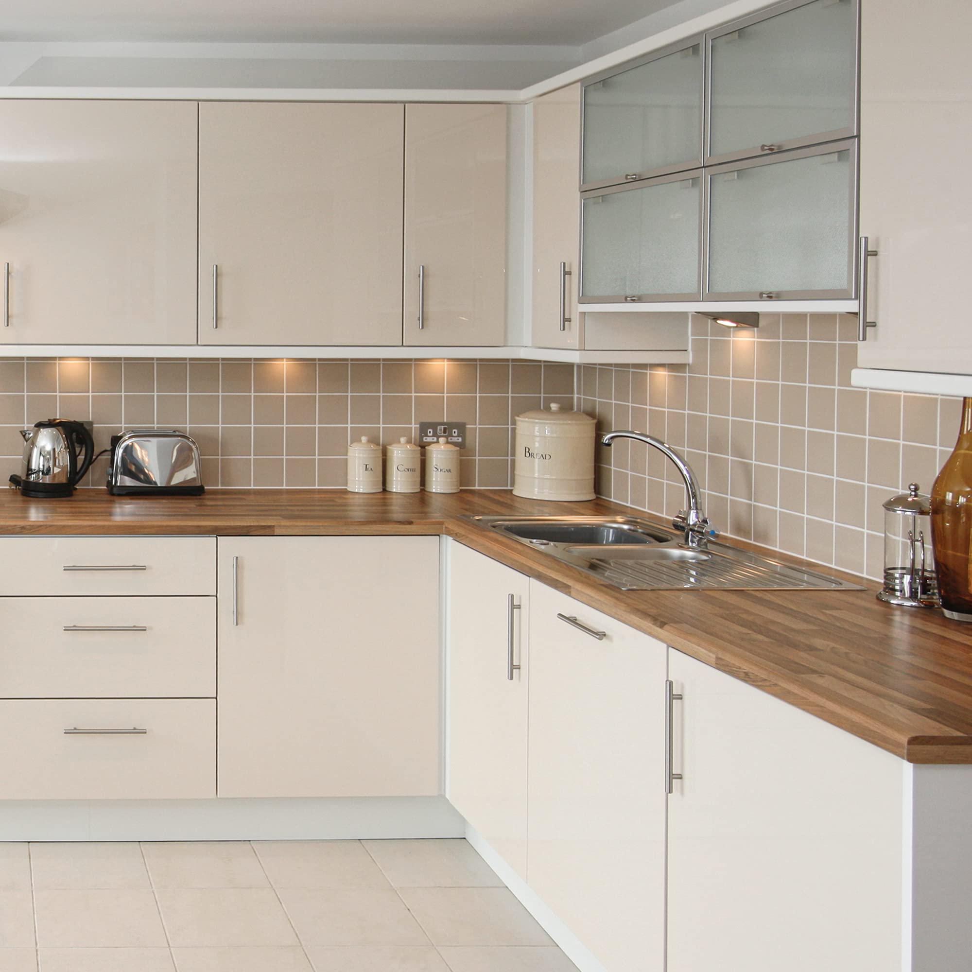 Ravinte transitional hardware in brushed nickel brightens modern and classic spaces